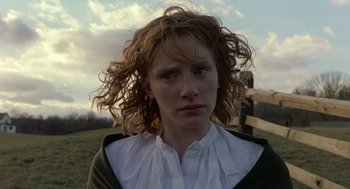 Movie still from “The Village” (2004), directed by M. Night Shyamalan – A person with long hair; Close Up shot, Low angle