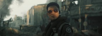 Movie still from “The Wandering Earth II” (2023), directed by Frant Gwo – A man wearing sunglasses and a black jacket; Close Up shot, Over the shoulder angle