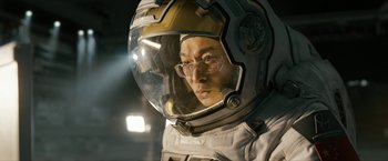 Movie still from “The Wandering Earth II” (2023), directed by Frant Gwo – A man in a spacesuit with a helmet on; Close Up shot, Low angle