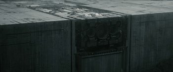 Movie still from “The Wandering Earth II” (2023), directed by Frant Gwo – View of a building with a clock on it's side; Extreme Wide shot, High angle
