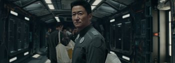 Movie still from “The Wandering Earth II” (2023), directed by Frant Gwo – A person wearing a uniform; Close Up shot, Over the shoulder angle