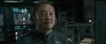 Movie still from “The Wandering Earth II” (2023), directed by Frant Gwo – A person wearing a headset; Close Up shot, Low angle
