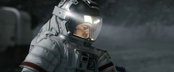 Movie still from “The Wandering Earth II” (2023), directed by Frant Gwo – A man in a spacesuit with a helmet on his head; Close Up shot, Low angle