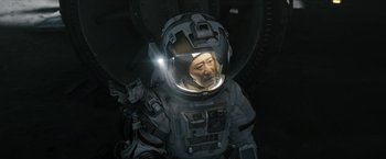 Movie still from “The Wandering Earth II” (2023), directed by Frant Gwo – A man in a spacesuit with a helmet on his head; Medium shot, High angle