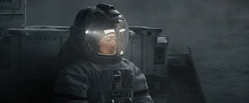 Movie still from “The Wandering Earth II” (2023), directed by Frant Gwo – A man wearing a space suit and helmet; Medium shot, Low angle