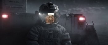 Movie still from “The Wandering Earth II” (2023), directed by Frant Gwo – A man wearing a space suit and helmet; Medium shot, Low angle