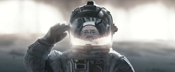 Movie still from “The Wandering Earth II” (2023), directed by Frant Gwo – An old man in a spacesuit is saluting; Close Up shot, Low angle