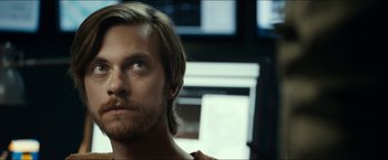 Movie still from “The Wave” (2015), directed by Roar Uthaug – A person with long hair; Close Up shot, Over the shoulder angle