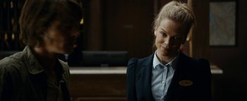 Movie still from “The Wave” (2015), directed by Roar Uthaug – A woman in a black jacket and a white shirt; Close Up shot, Over the shoulder angle