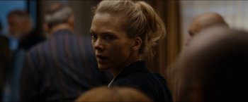 Movie still from “The Wave” (2015), directed by Roar Uthaug – A woman with blonde hair is looking at the camera; Close Up shot, Over the shoulder angle