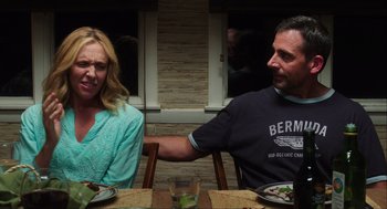 Movie still from “The Way Way Back” (2013), directed by Jim Rash – A man and a woman sitting at a dinner table; Medium shot, Over the shoulder angle