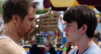 Movie still from “The Way Way Back” (2013), directed by Jim Rash – A man and a young boy face each other; Close Up shot, Over the shoulder angle