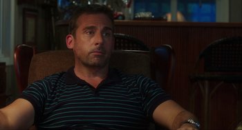 Movie still from “The Way Way Back” (2013), directed by Jim Rash – A person sitting in a chair; Medium shot, Over the shoulder angle