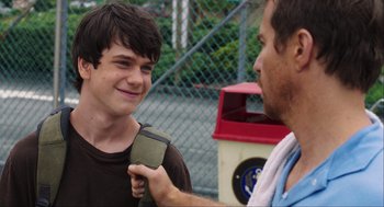 Movie still from “The Way Way Back” (2013), directed by Jim Rash – A young man is being interviewed by an older man; Close Up shot, Over the shoulder angle