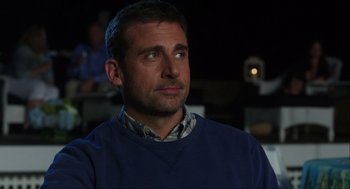 Movie still from “The Way Way Back” (2013), directed by Jim Rash – A person wearing a blue sweater; Close Up shot, Over the shoulder angle