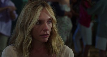 Movie still from “The Way Way Back” (2013), directed by Jim Rash – A person with long blonde hair; Close Up shot, Over the shoulder angle