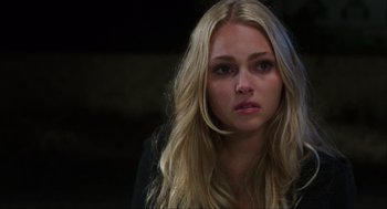 Movie still from “The Way Way Back” (2013), directed by Jim Rash – A beautiful blonde woman with long hair; Close Up shot, Over the shoulder angle