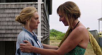 Movie still from “The Way Way Back” (2013), directed by Jim Rash – Two women standing next to each other on a field; Close Up shot, Over the shoulder angle