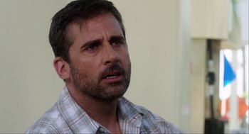 Movie still from “The Way Way Back” (2013), directed by Jim Rash – A person wearing a plaid shirt; Close Up shot, Over the shoulder angle