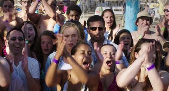 Movie still from “The Way Way Back” (2013), directed by Jim Rash – A group of young people standing next to each other; Medium shot, Over the shoulder angle