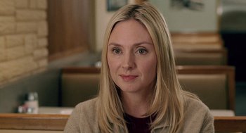 Movie still from “The Weather Man” (2005), directed by Gore Verbinski – A person sitting in a room; Close Up shot, Over the shoulder angle