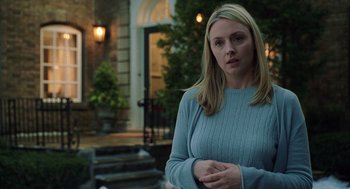 Movie still from “The Weather Man” (2005), directed by Gore Verbinski – A woman standing in front of a house; Medium shot, Over the shoulder angle