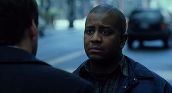 Movie still from “The Weather Man” (2005), directed by Gore Verbinski – A person looking at something; Close Up shot, Over the shoulder angle