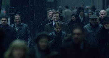 Movie still from “The Weather Man” (2005), directed by Gore Verbinski – A crowd of people walking in the rain; Medium shot, Over the shoulder angle