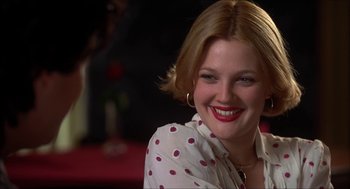 Movie still from “The Wedding Singer” (1998), directed by Frank Coraci – A person wearing a polka dot shirt; Close Up shot, Over the shoulder angle