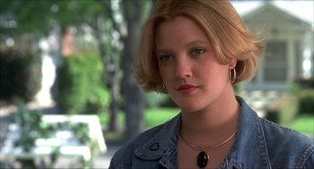 Movie still from “The Wedding Singer” (1998), directed by Frank Coraci – A person wearing a jean jacket; Close Up shot, Low angle