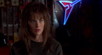 Movie still from “The Wedding Singer” (1998), directed by Frank Coraci – A person wearing a black shirt; Close Up shot, Over the shoulder angle