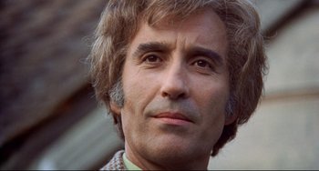 Movie still from “The Wicker Man” (1973), directed by Robin Hardy – A man's face with a beard; Close Up shot, Low angle