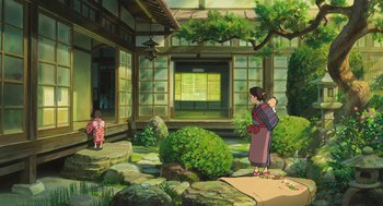 Movie still from “The Wind Rises” (2013), directed by Hayao Miyazaki – A woman holding a baby in her arms in front of a house; Extreme Wide shot, Low angle