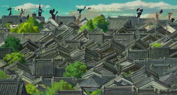 Movie still from “The Wind Rises” (2013), directed by Hayao Miyazaki – An illustration of a city with many roofs and trees; Extreme Wide shot, High angle