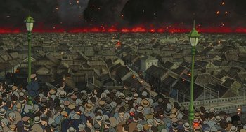 Movie still from “The Wind Rises” (2013), directed by Hayao Miyazaki – A crowd of people standing in front of burning buildings; Extreme Wide shot, High angle