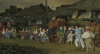 Movie still from “The Wind Rises” (2013), directed by Hayao Miyazaki – A crowd of people walking down a street; Extreme Wide shot, High angle