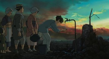 Movie still from “The Wind Rises” (2013), directed by Hayao Miyazaki – A couple of people standing next to each other near a faucet; Wide shot, Low angle