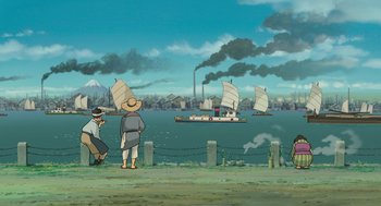 Movie still from “The Wind Rises” (2013), directed by Hayao Miyazaki – Two people standing on a pier looking out at a boat; Extreme Wide shot, High angle