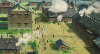 Movie still from “The Wind Rises” (2013), directed by Hayao Miyazaki – An aerial view of an old western town with a bunch of people walking around; Extreme Wide shot, High angle