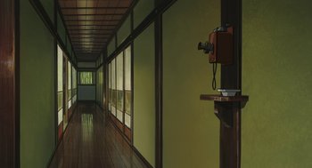 Movie still from “The Wind Rises” (2013), directed by Hayao Miyazaki – An empty hallway with a telephone on the wall; Extreme Wide shot, Low angle
