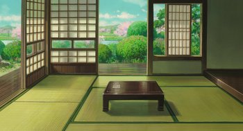 Movie still from “The Wind Rises” (2013), directed by Hayao Miyazaki – An empty room with a large window and a wooden coffee table in it; Extreme Wide shot, High angle