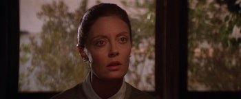 Movie still from “The Witches of Eastwick” (1987), directed by George Miller – A person wearing a sweater; Close Up shot, Low angle