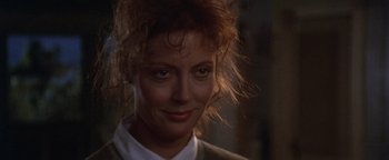 Movie still from “The Witches of Eastwick” (1987), directed by George Miller – A person wearing a jacket; Close Up shot, Over the shoulder angle