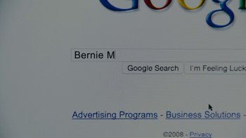 Movie still from “The Wizard of Lies” (2017), directed by Barry Levinson – View of a google search page; Extreme Close Up shot, High angle