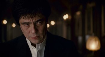 Movie still from “The Wolfman” (2010), directed by Joe Johnston – A person wearing a suit and tie; Close Up shot, Low angle