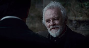 Movie still from “The Wolfman” (2010), directed by Joe Johnston – An older man with white hair talking to a younger man; Close Up shot, Over the shoulder angle