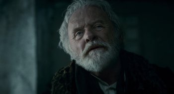 Movie still from “The Wolfman” (2010), directed by Joe Johnston – An old man with white hair and a white beard; Close Up shot, Low angle