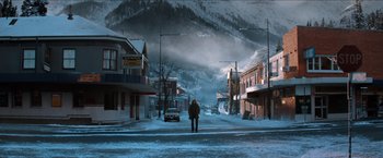 Movie still from “The Wolverine” (2013), directed by James Mangold – A person standing on the side of a road in the middle of the day; Extreme Wide shot, High angle