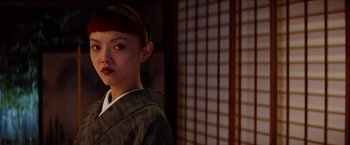 Movie still from “The Wolverine” (2013), directed by James Mangold – A young woman wearing a kimono in front of a window; Close Up shot, Low angle