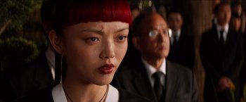 Movie still from “The Wolverine” (2013), directed by James Mangold – A person with a red head; Close Up shot, Over the shoulder angle